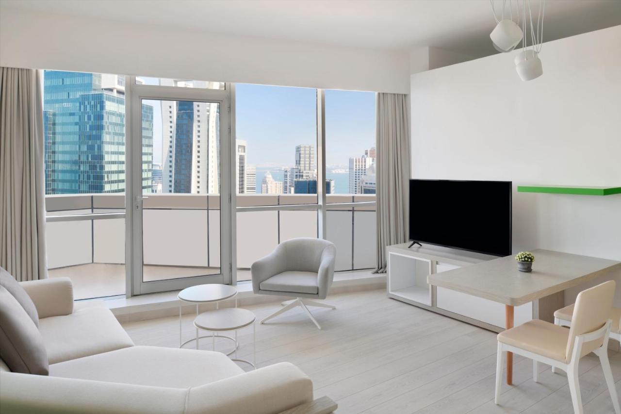 Element By Westin West Bay Doha 호텔 외부 사진 A living room in a condominium